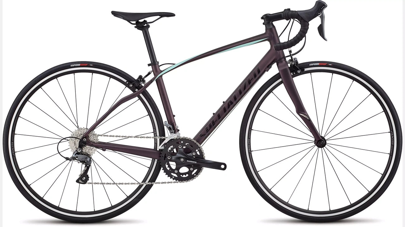A sleek, modern road bicycle with a dark matte finish and aerodynamic design.